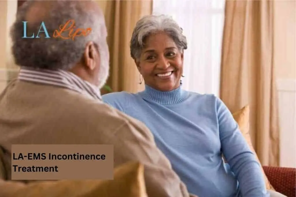 Couple sat smiling at each other - LA-EMS treatment Bradford